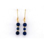 A pair of Italian 18 carat gold and blue stone earrings, the drop set with three spherical beads,