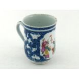A Chinese export ceramic famille rose tea cup, decorated in blue and white and under glaze carving