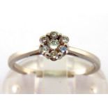 A diamond daisy cluster ring, the small 6mm diameter cluster composed of seven brilliants, mounted