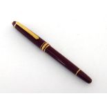 Montblanc Meisterstuck, a burgundy resin fountain pen, no. VK1816777, with medium nib, cartridge