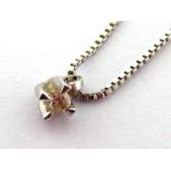 An Italian 18 carat white gold and single stone diamond pendant, the small brilliant approx. 0.04