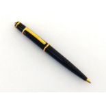 Cartier, Diablo, a black resin rollerball pen, with synthetic sapphire cabochon cap, no box or