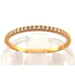 Georg Jensen, Aurora, a slim diamond and rose gold eternity ring, the small brilliants totalling 0.