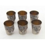 A set of six Chinese Export silver tot cups by Tuck Chang of Shanghai, circa 1920, applied around