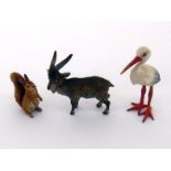 Three cold painted bronzes, a goat, a stork and a squirrel. Tallest 4.5cm.