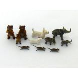 Family groups of miniature cold painted bronze figures, comprising three elephants, three bears,