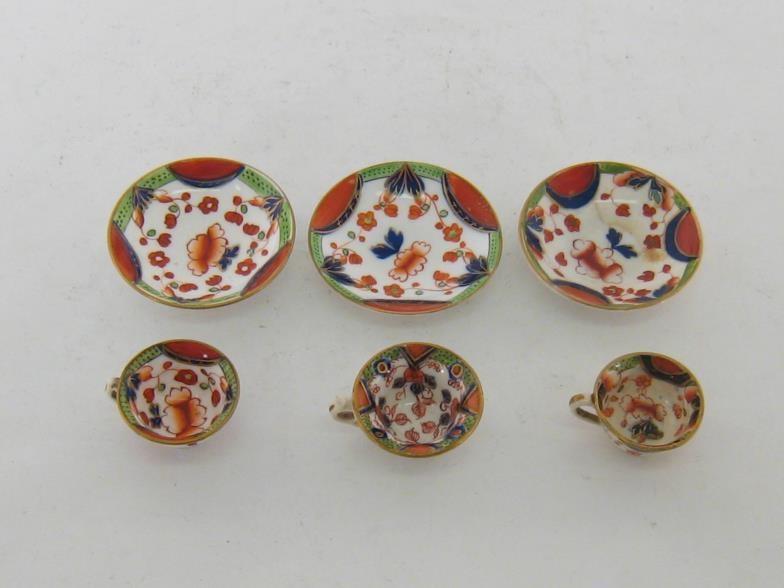 Three 19th. century miniature cups and saucers in the Crown Derby palette, unmarked apart from one - Image 2 of 6