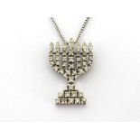 A diamond menorah pendant, pave set overall with small single and marquise cut diamonds, the white