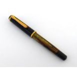Pelikan, Souveran 800, a striated marble brown lacquer and resin fountain pen, circa 1940, marked '