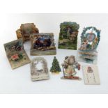 A collection of seven 19th. century German stand-up three dimensional Christmas cards, together with