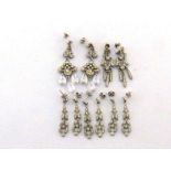 A collection of rhodium plated silver and crystal set chandelier earrings by Andrew Prince,