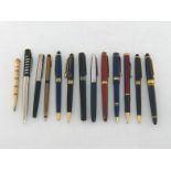 A mixed lot of pens, including a rolled gold Wahl Eversharp retractable pencil, a Sheaffer Lady '