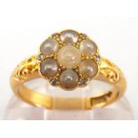 A seed pearl and rose cut diamond cluster ring, the cluster 10mm diameter, the shank stamped '