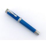 A Harley Davidson fountain pen, design by Ines Duglay, with metallic blue barrel, fine nib (