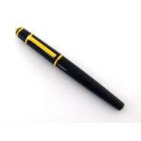 Cartier, Diablo, a black resin fountain pen, no. 114373, with cartridge filler and medium nib, no