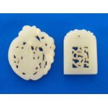 Two Chinese white jade plaques finely carved and pierced on both sides, the rectangular white jade