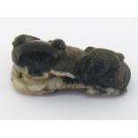 A Chinese black and white jade carving of “buffalo and boy” group, jade is finely carved and pierced