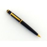 Cartier, Diablo, a black resin pencil, no. 034670, with gilt signed band, no box or paperwork