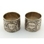 A pair of Chinese Export silver napkin rings by Leeching of Canton, Hong Kong & Shanghai, circa