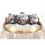 A three stone diamond ring, the graduated old cuts totalling approx. 0.65 carat, the shank