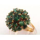 A green tourmaline bombe cluster ring, the circular cluster composed of three tiers of round cut