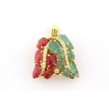 A 1950s emerald, ruby and diamond 'tutti frutti' pendant, converted from a double clasp, possibly by