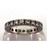 A diamond eternity ring, composed of 21 brillliants, totalling approx. 0.84 carat, mounted in