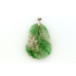 An Art Deco carved jadeite pendant, designed as fish amongst reeds, 5.8cm long, with white metal