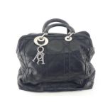 Christian Dior, 'Lady Dior', a black lambskin handbag, with three compartments, the central with zip