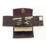 A surgeon’s pocket instrument kit by J H Montague, 101 New Bond Street, in a folding maroon