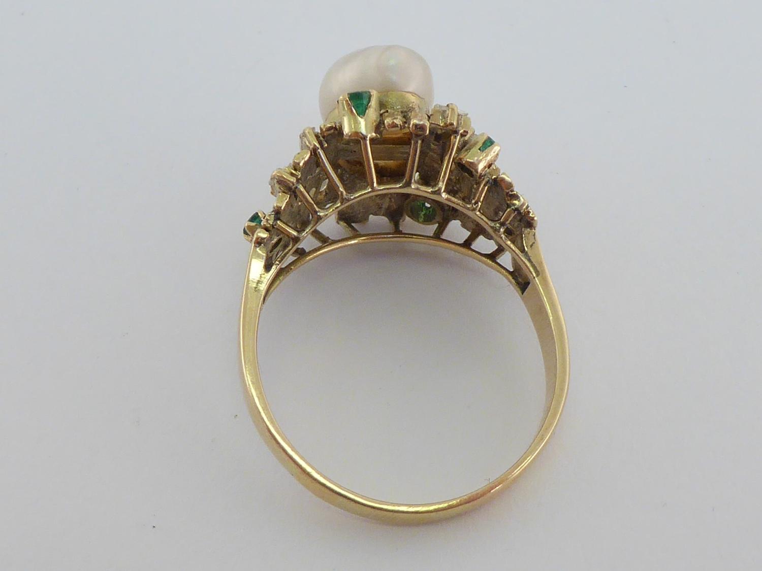 A 1970s baroque pearl, diamond and emerald dress ring, the central baroque pearl 12mm long, above - Image 2 of 4