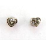 A pair of diamond ear studs, the heart shaped diamonds totalling approx. 1.5 carat, mounted in white