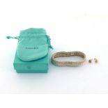 TIFFANY & Co., a silver mesh bracelet, signed on tag to the inner bracelet, 54.4gms, with box and