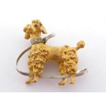 A diamond and ruby brooch, modelled as a poodle, with single cut collar, stamped verso '18ct SD',