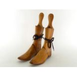 A pair of vintage lady’s beech wood boot trees, size 3, with articulated foot.