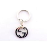 GUCCI, a silver keyring, with Gucci logo, 23.5gms