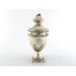 A George III silver tea caddy or sugar vase by William Holmes & Nicholas Dumee, London, 1774, vase-