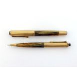 PELIKAN, a 1960s marbled resin and gold plated 'Gunther Wagner' fountain pen and push pencil set,