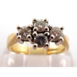 An 18 carat gold and diamond four stone ring, the cluster of four brilliants totalling approx. 0.