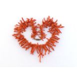 A coral necklace, composed of branch fragments, to a screw barrel clasp, 65gms