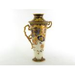 An unusual tall Royal Crown Derby vase tapering up and out from a narrow spread base to an enclosing