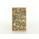 A Chinese Canton carved ivory plaque, finely deep relief depicts a battle scene featuring cavalry