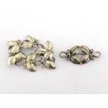 A 20th century Swedish silver brooch by Birger Haglund, of leaf and scroll design, signed and
