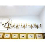 A cast brass silver/copper antique finish electric chandelier with seven arms, the central boss with