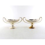 A good matched pair of silver two-handled boat-shaped tazze by Horace Woodward & Co. Ltd., London,