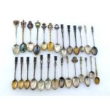 Ten French silver tea and coffee spoons, each with town arms finials and respective name of town