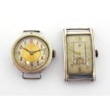 An Art Deco silver (800 standard) manual wind wristwatch, the rectangular case with silvered dial,