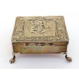 An Edwardian silver trinket box by Nathan & Hayes, Chester, 1907, oblong on 4 ball feet, cover die-