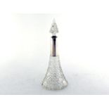 A German .800 standard silver-mounted curved tapering cut-glass perfume bottle, the spire stopper