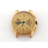 TEXA, a 1940s 18 carat gold chronograph wristwatch, the two tone gilt dial with outer tachymeter and